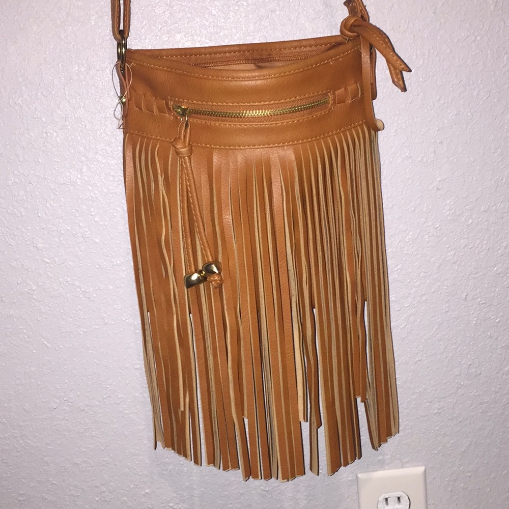 Tan tasseled bag